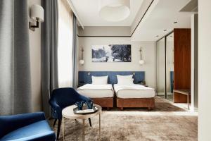 Posteľ alebo postele v izbe v ubytovaní Hotel Unicus Krakow Old Town - Destigo Hotels