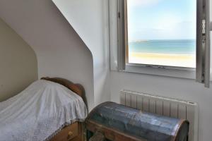 Posteľ alebo postele v izbe v ubytovaní Côté Plage - Maison pour 12 vue mer