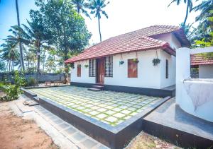 Zahrada ubytování Ocean View Beach Villa Varkala by VOYE HOMES