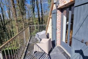 Balkón alebo terasa v ubytovaní Jardins de Mélusine - Maison en pierres