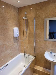 Koupelna v ubytování Broadhaven Bay Apartment + 13 fotografií