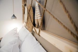 Postel nebo postele na pokoji v ubytování NEREA - Apulian Suite and Rooms