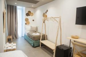 Postel nebo postele na pokoji v ubytování NEREA - Apulian Suite and Rooms