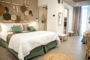 Postel nebo postele na pokoji v ubytování NEREA - Apulian Suite and Rooms
