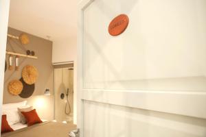 Postel nebo postele na pokoji v ubytování NEREA - Apulian Suite and Rooms