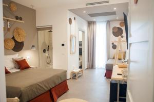 Postel nebo postele na pokoji v ubytování NEREA - Apulian Suite and Rooms