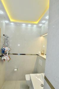 Kúpeľňa v ubytovaní Apartament Piaskowy Jantar 2