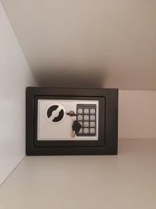 a microwave on the ceiling of a room at AGORA LUXURY LOFT in Ayios Nikolaos Sithonia