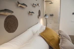 Postel nebo postele na pokoji v ubytování NEREA - Apulian Suite and Rooms