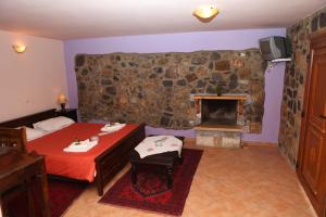 Postel nebo postele na pokoji v ubytování Pasithea Mountain Chalet + 29 fotografií