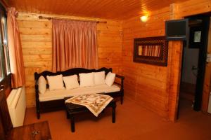 Posezení v ubytování Pasithea Mountain Chalet
