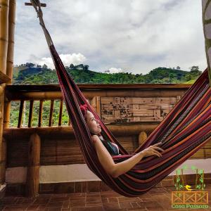 a young child laying in a hammock at Casa Passaro 3 in Córdoba