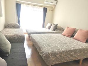 Ліжко або ліжка в номері B House -- Self Check in -- Room Number & Password is in the following email