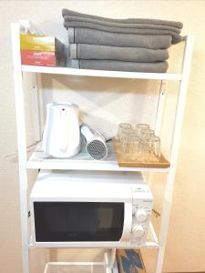 Кухня або міні-кухня у B House -- Self Check in -- Room Number & Password is in the following email