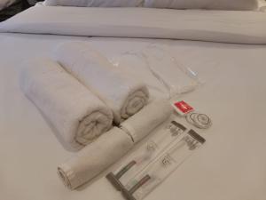 Postel nebo postele na pokoji v ubytování D Loft Hotel
