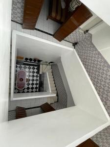 an overhead view of a staircase in a house at Riad NEJJARINE in Marrakesh