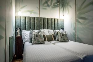 Postel nebo postele na pokoji v ubytování Hotel Duomo Firenze