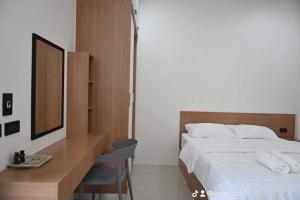 T-OneHome客房内的一张或多张床位
