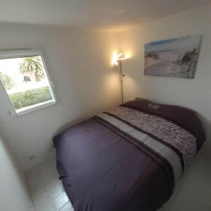 Posteľ alebo postele v izbe v ubytovaní Appartement 6 personnes les Sables d'Olonne
