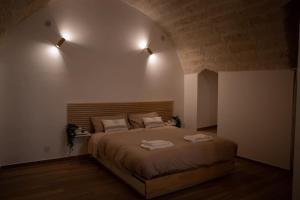 Ένα ή περισσότερα κρεβάτια σε δωμάτιο στο Loft Michelangelo