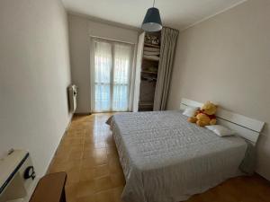 Кровать или кровати в номере Comodo alloggio in Beinette - Casa Allegri