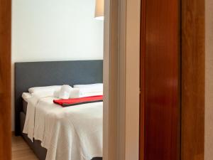 Letto o letti in una camera di Apartment Olympic R4 by Interhome
