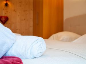 Letto o letti in una camera di Apartment Olympic R4 by Interhome