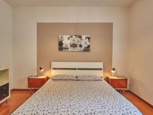 A bed or beds in a room at Holiday Home Simoni - GLA107 by Interhome