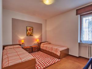 A bed or beds in a room at Holiday Home Simoni - GLA107 by Interhome
