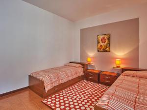 A bed or beds in a room at Holiday Home Simoni - GLA107 by Interhome