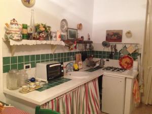 Casa Mariucciaにあるキッチンまたは簡易キッチン