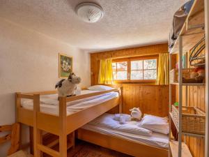 Postel nebo postele na pokoji v ubytování Chalet L'Alouette by Interhome