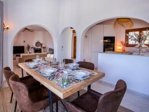 a dining room with a table and chairs at Holiday Home Lucia by Interhome in Monte Pego