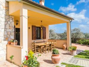 A balcony or terrace at Holiday Home Melograno-2 by Interhome