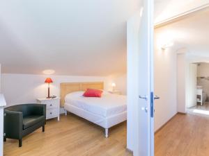 A bed or beds in a room at Holiday Home Melograno-2 by Interhome