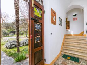 een deur naar een trap met uitzicht bij Holiday Home Podere Casina by Interhome in Sinalunga