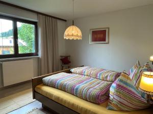 Ένα ή περισσότερα κρεβάτια σε δωμάτιο στο Apartment Helga by Interhome +15 φωτογραφίες