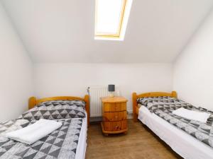 Posteľ alebo postele v izbe v ubytovaní Apartment Gabor by Interhome