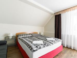 Posteľ alebo postele v izbe v ubytovaní Apartment Gabor by Interhome
