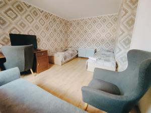 Φωτογραφία από το άλμπουμ του Siedem Ogrodów - Pokoje w Domku Kucharza σε Łowicz Wałecki +20 φωτογραφίες