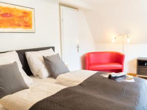 Postel nebo postele na pokoji v ubytování Holiday Home Jula by Interhome