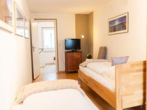 Postel nebo postele na pokoji v ubytování Holiday Home Jula by Interhome