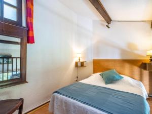 Postel nebo postele na pokoji v ubytování Apartment Les Mas de Pramousquier-11 by Interhome