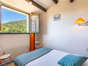 Postel nebo postele na pokoji v ubytování Apartment Les Mas de Pramousquier-11 by Interhome + 21 fotografií