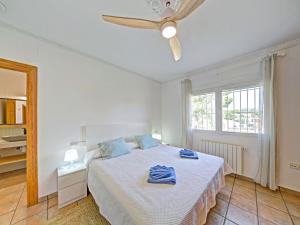 A bed or beds in a room at Holiday Home La Sal by Interhome