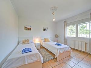 A bed or beds in a room at Holiday Home La Sal by Interhome