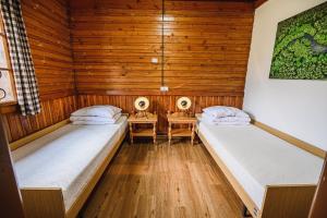 Ένα ή περισσότερα κρεβάτια σε δωμάτιο στο Holiday Home Iris