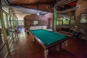 a room with a pool table in it at El Molino - Complejo Turístisco in Victoria