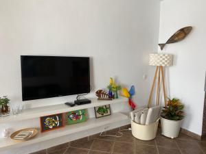 Televízia a/alebo spoločenská miestnosť v ubytovaní Vv - Apartamento Tranquilo Primera Línea