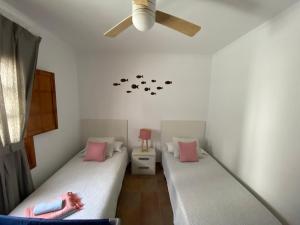 Posteľ alebo postele v izbe v ubytovaní Vv - Apartamento Tranquilo Primera Línea